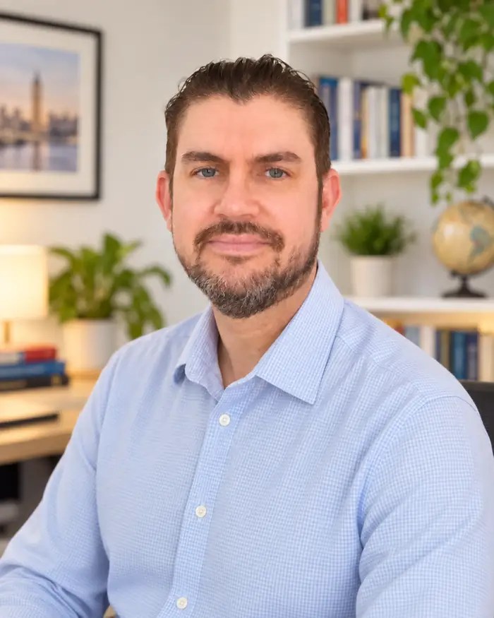 Paul, founder of English With Paul, in a bright home office